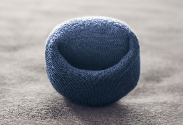 Blue navy uniform socks with 'smile'.