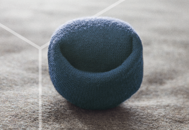 Blue Navy uniform sock folded with 'smile'.