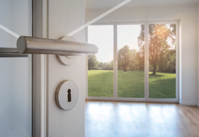 A sun-drenched new build home living room.