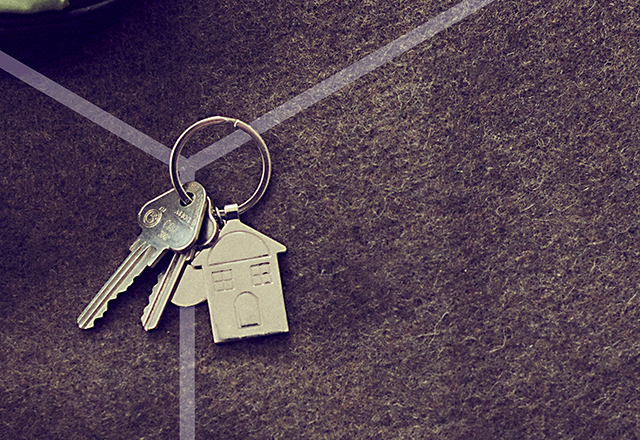 Keys on an army barracks blanket.