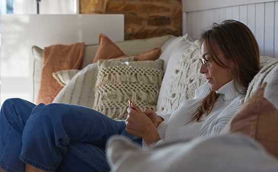 Woman-reclining-using-phone.jpg